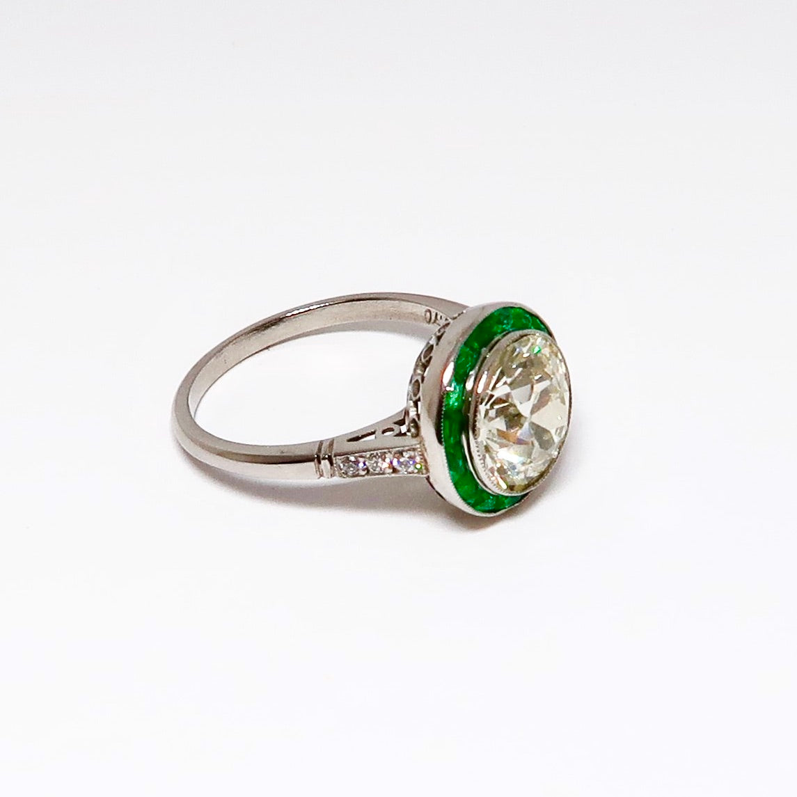 Round Diamond & Emerald Ring