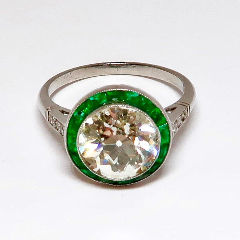 Round Diamond & Emerald Ring