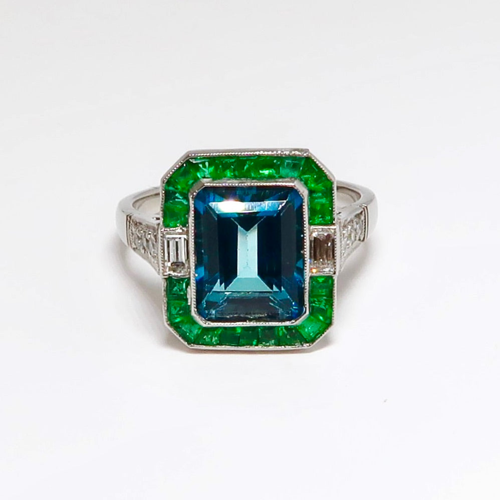 Blue Topaz, Emerald, & Diamond Ring