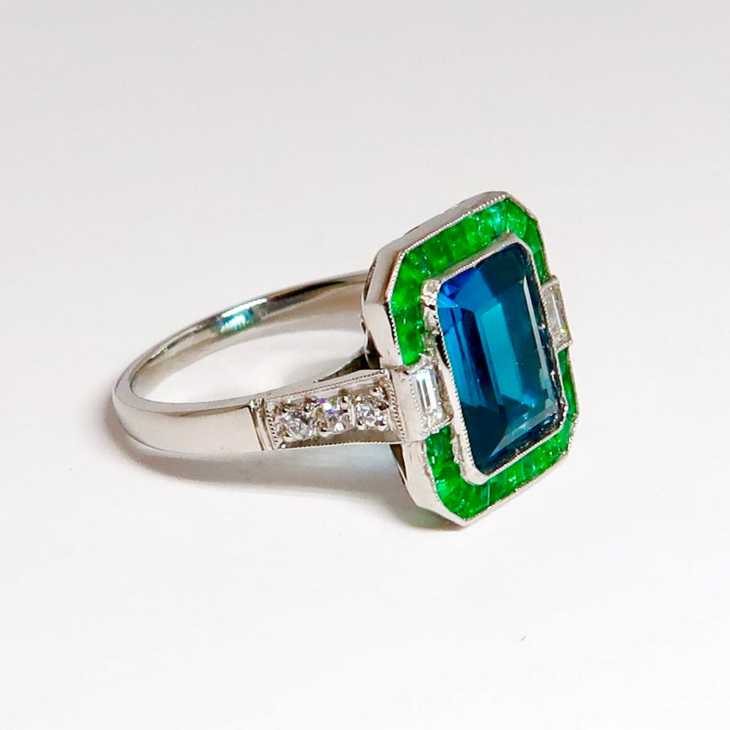 Blue Topaz, Emerald, & Diamond Ring