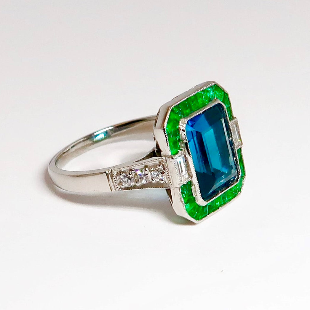 Blue Topaz, Emerald, & Diamond Ring