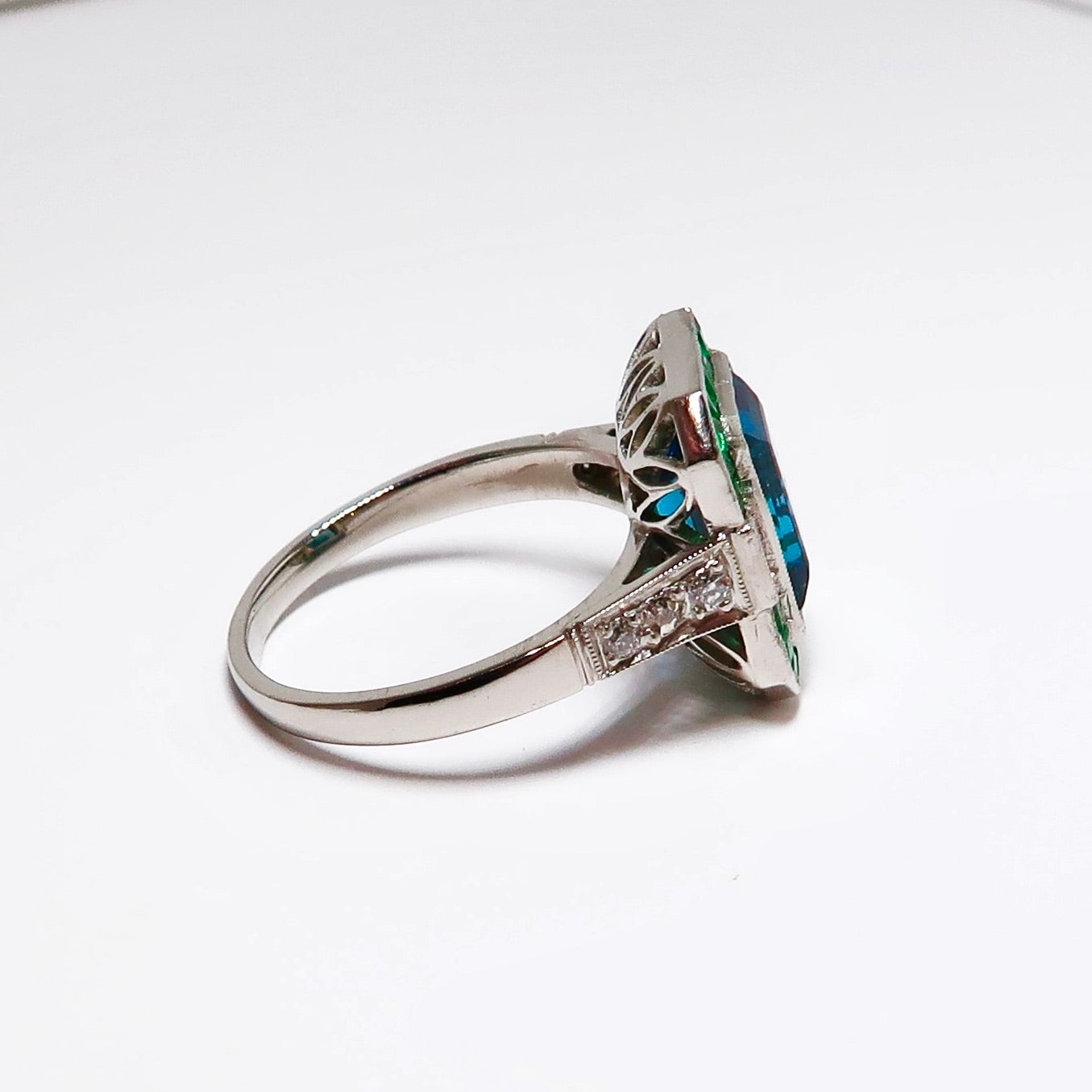 Blue Topaz, Emerald, & Diamond Ring