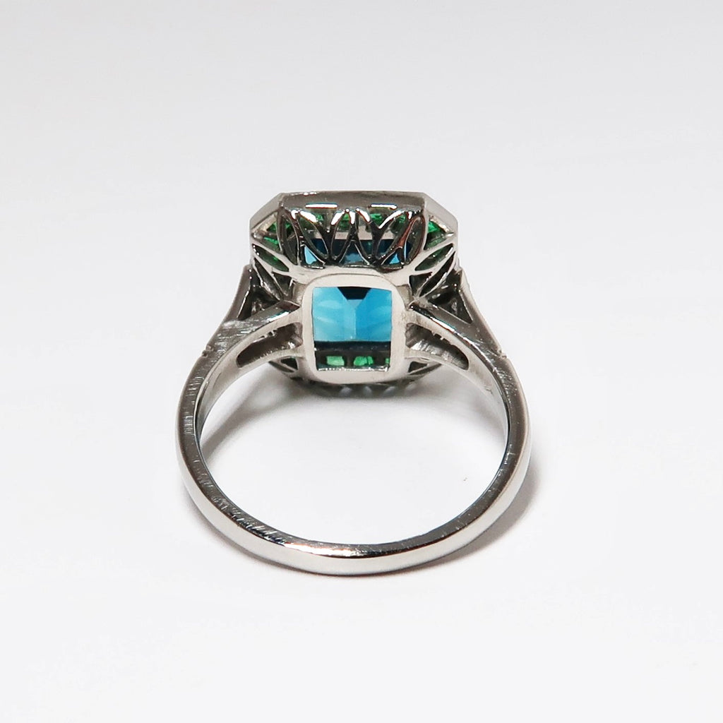 Blue Topaz, Emerald, & Diamond Ring