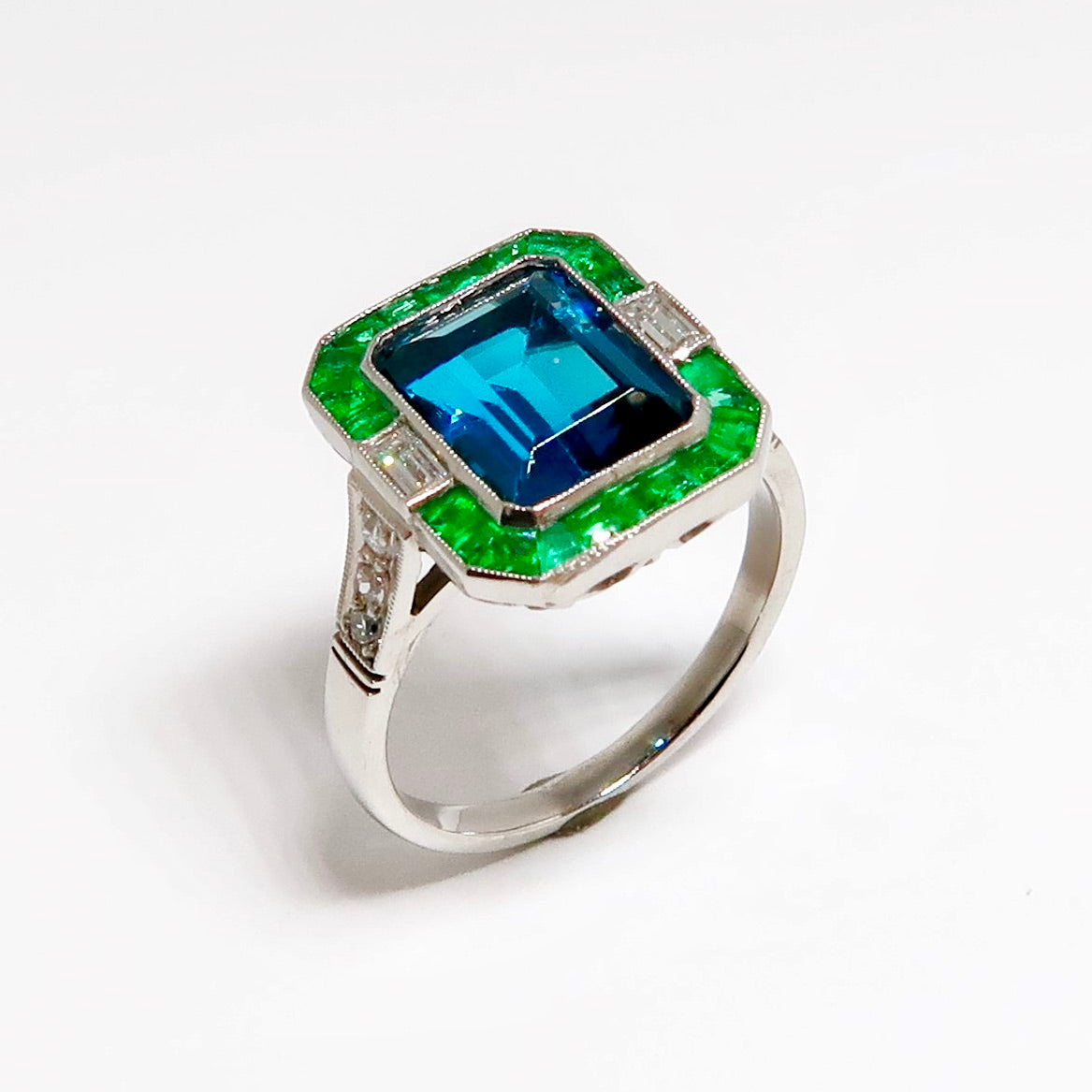 Blue Topaz, Emerald, & Diamond Ring