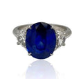 Platinum Oval Sapphire And Half Moon Diamond Ring