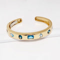 18k Yellow Gold Blue Topaz Bangle
