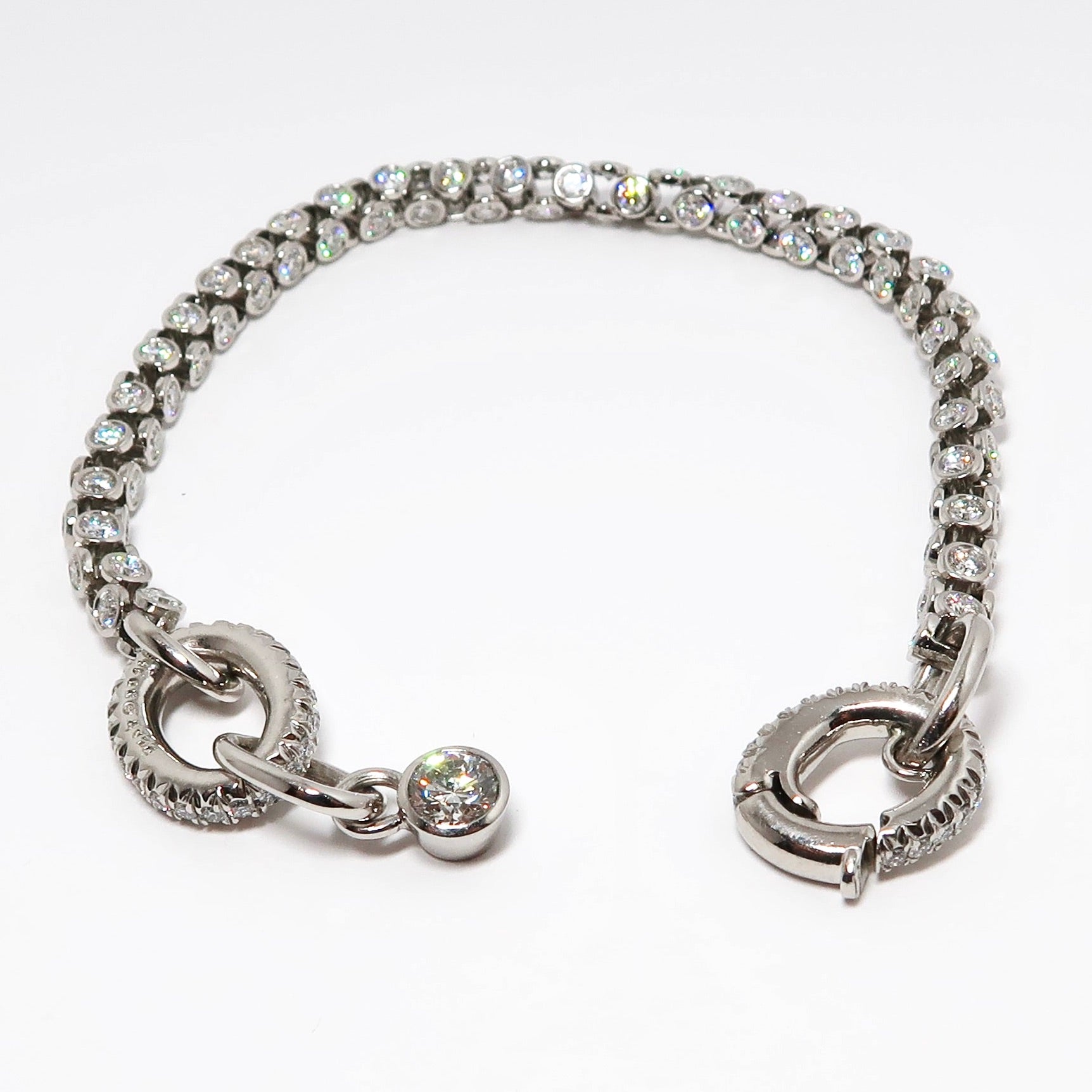 Platinum Diamond Bracelet with One Larger Round Diamond