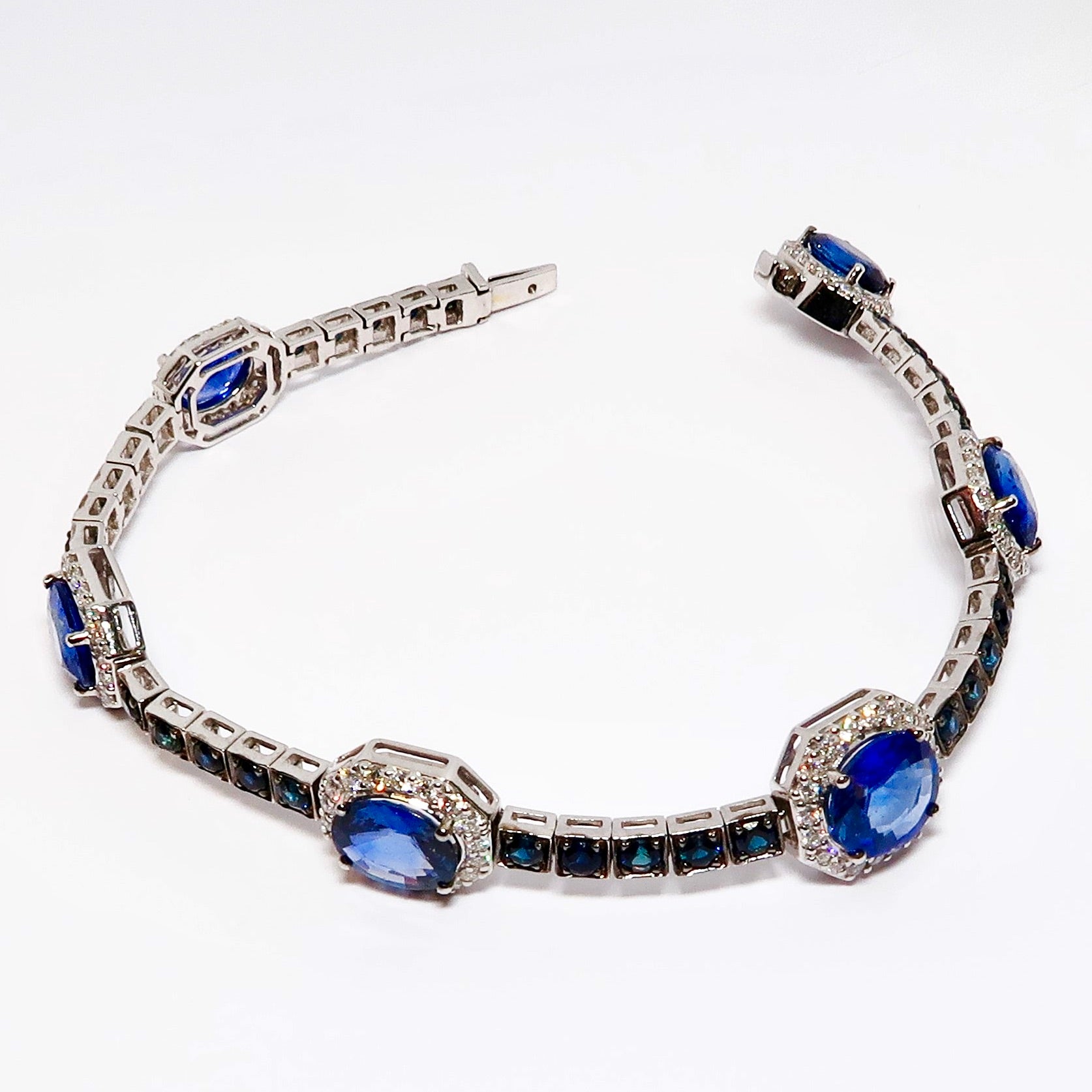 Faceted Oval Blue Sapphire Bracelet with Diamonds