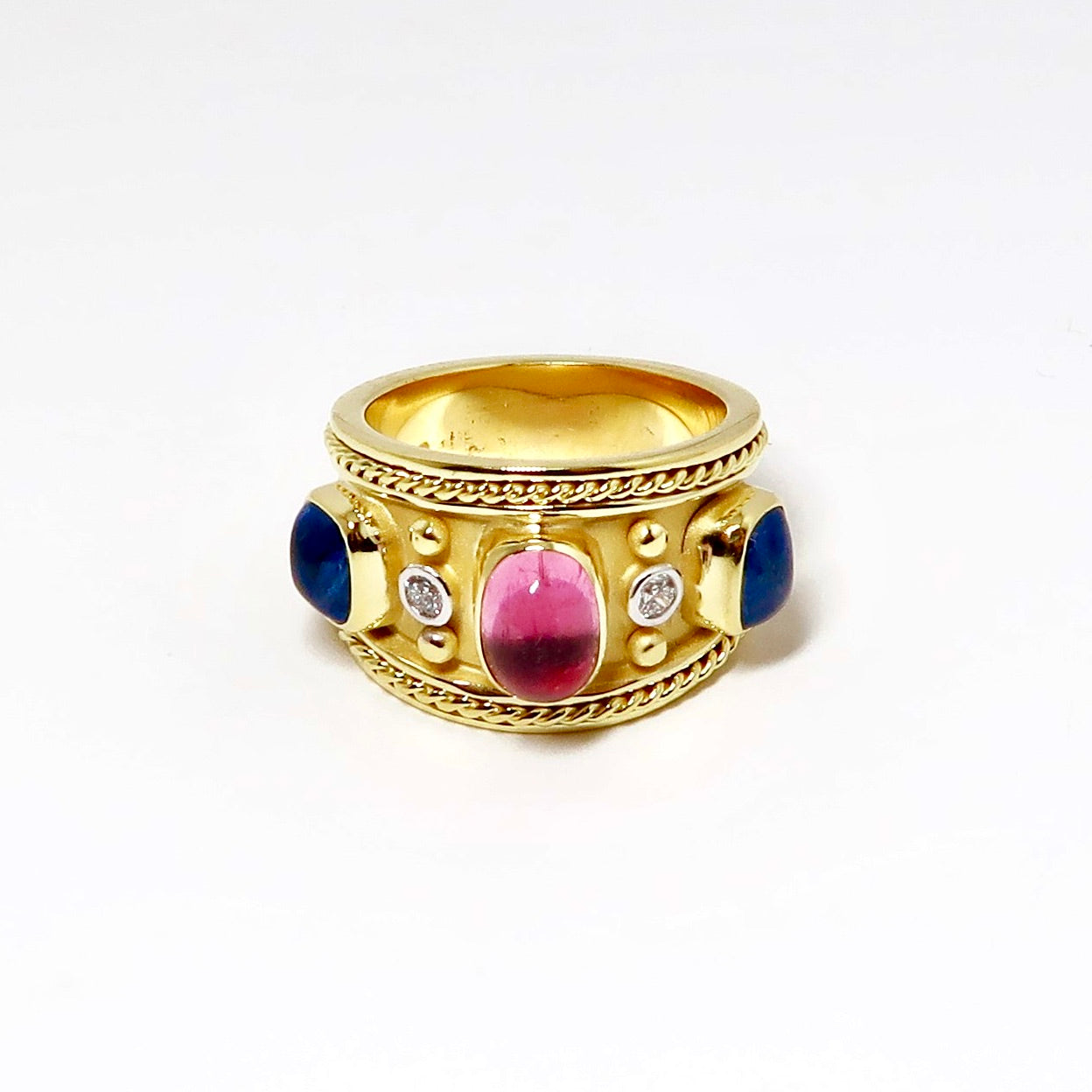 Wide Yellow Gold Ring with 2 Blue Sapphires, 1 Pink Sapphire Cabochons, and Diamonds