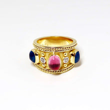 Load image into Gallery viewer, Wide Yellow Gold Ring with 2 Blue Sapphires, 1 Pink Sapphire Cabochons, and Diamonds
