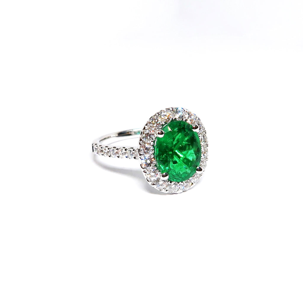 White Gold Oval Emerald Diamond Halo Ring