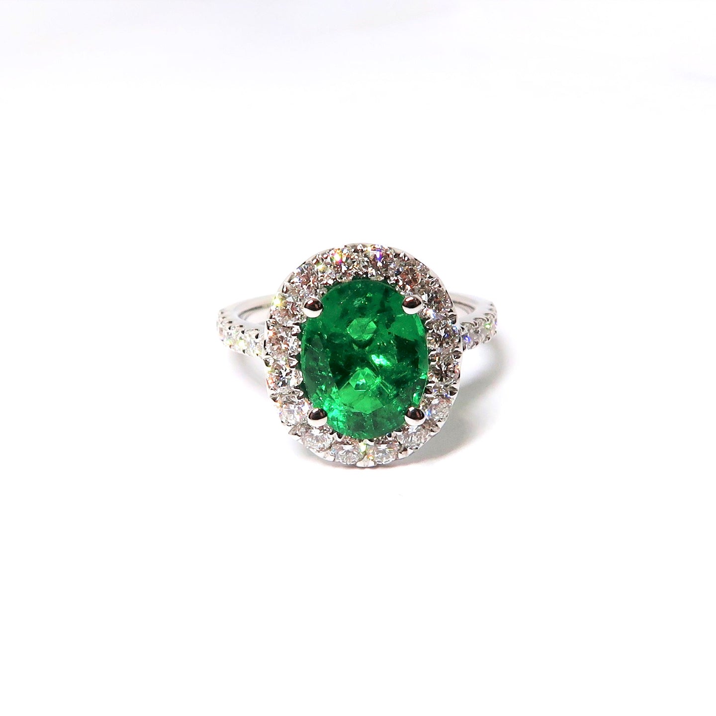White Gold Oval Emerald Diamond Halo Ring