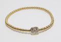 18k Yellow Gold Bangle with Square Shaped Station with Diamonds