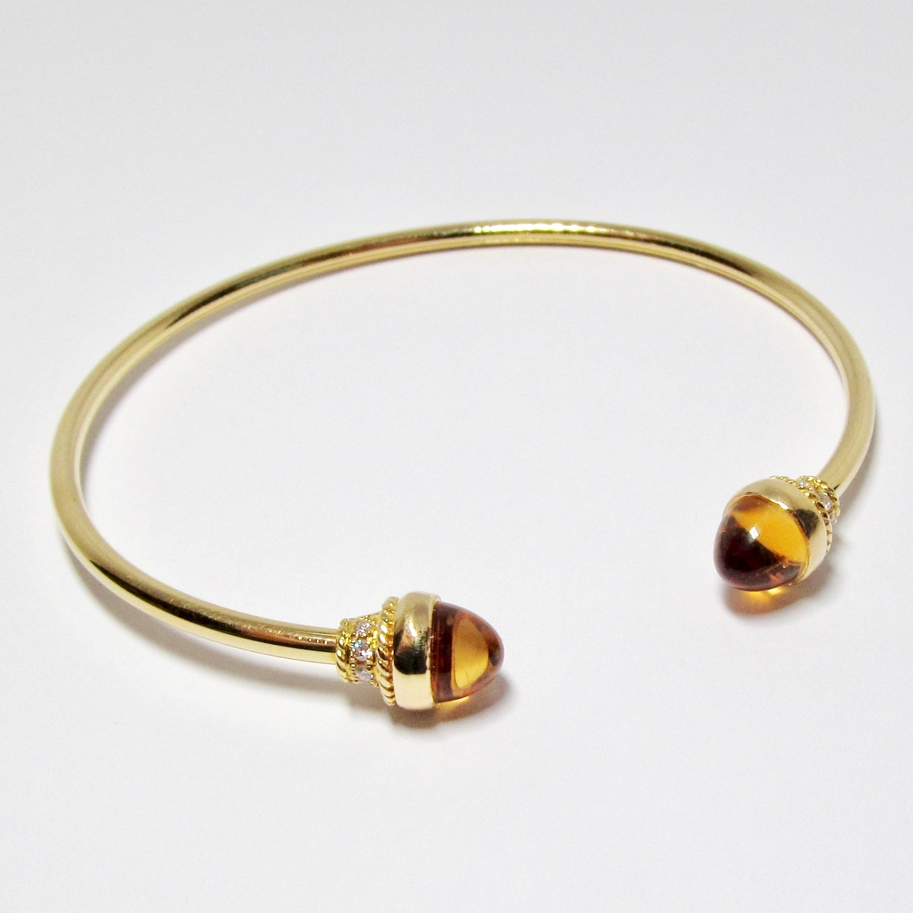 Gold Bracelet with Diamonds and Assorted Gems