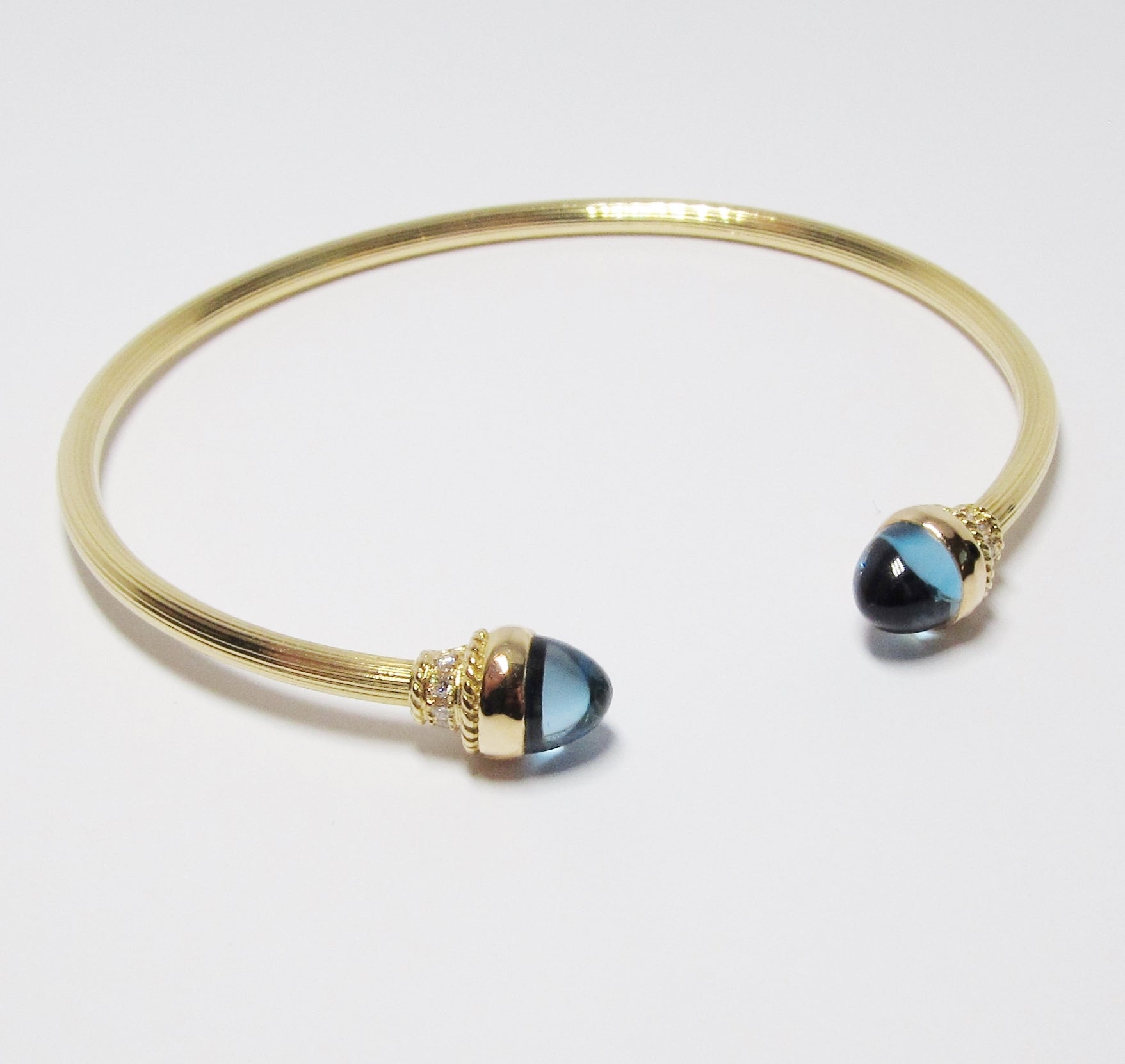 Gold Bracelet with Diamonds and Assorted Gems