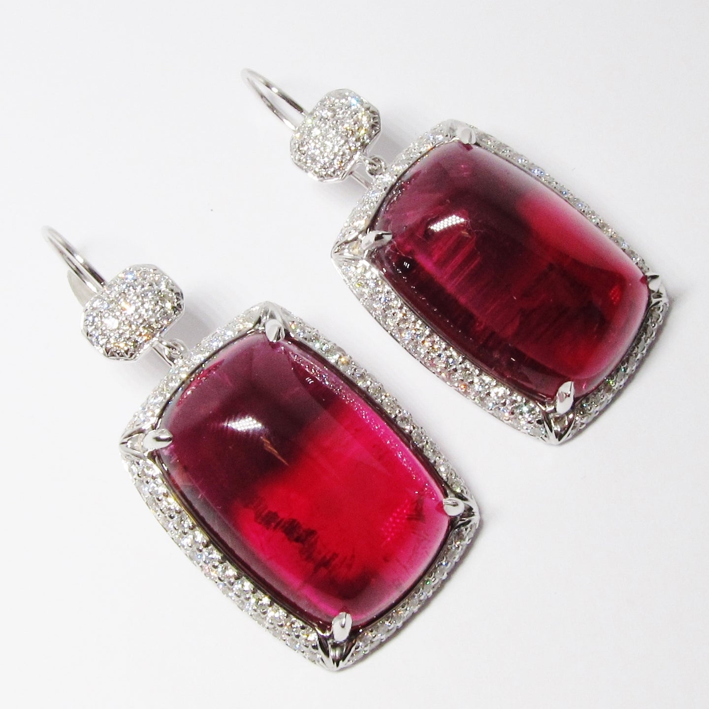 18k White Gold Cushion Shaped Cabochon Rubellite with Diamond Pave Frame Earrings