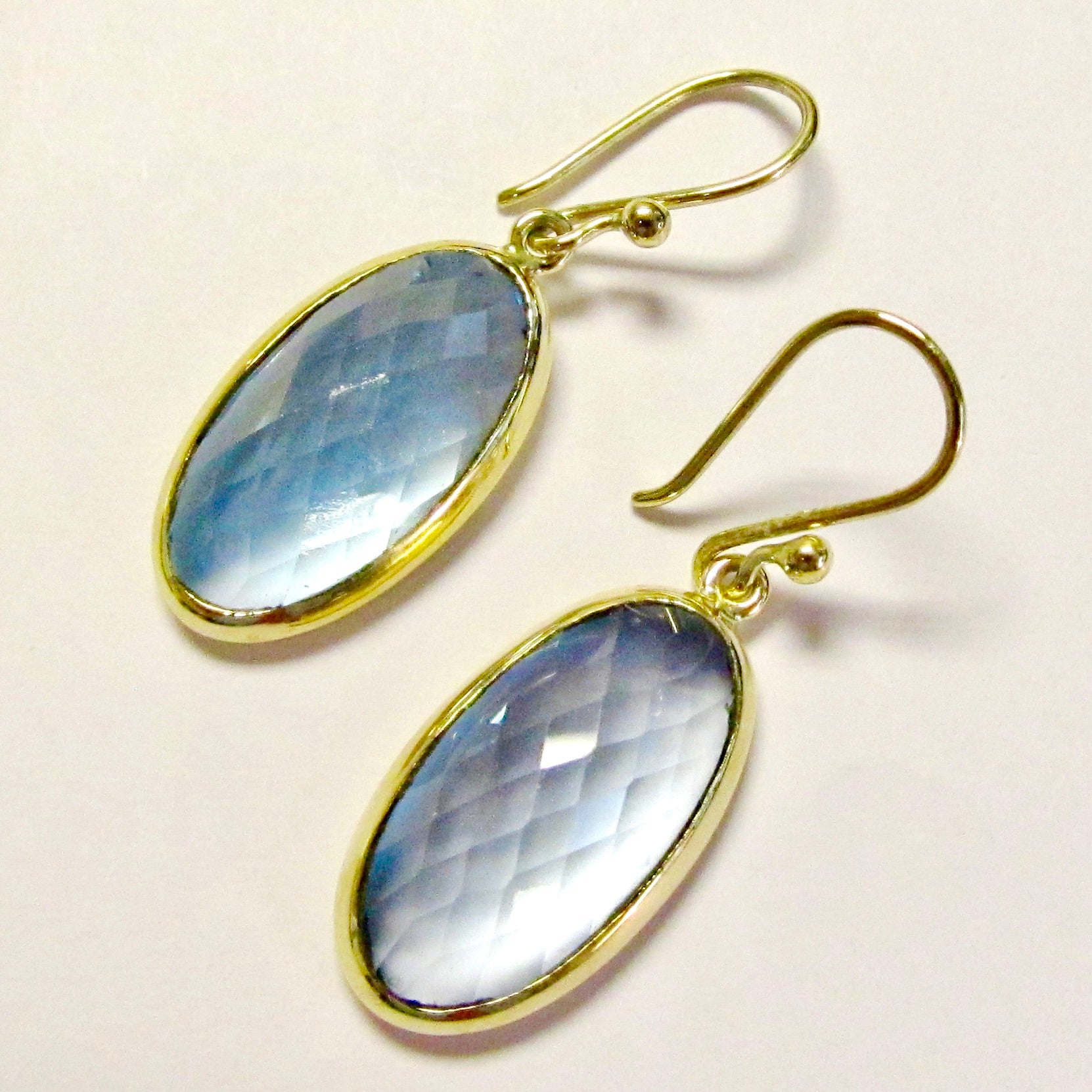 14k Yellow Gold Blue Topaz Oval Earrings