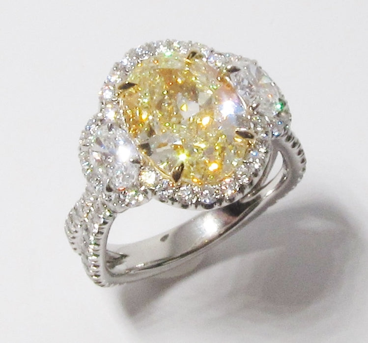 Oval Cut Yellow Diamond Ring