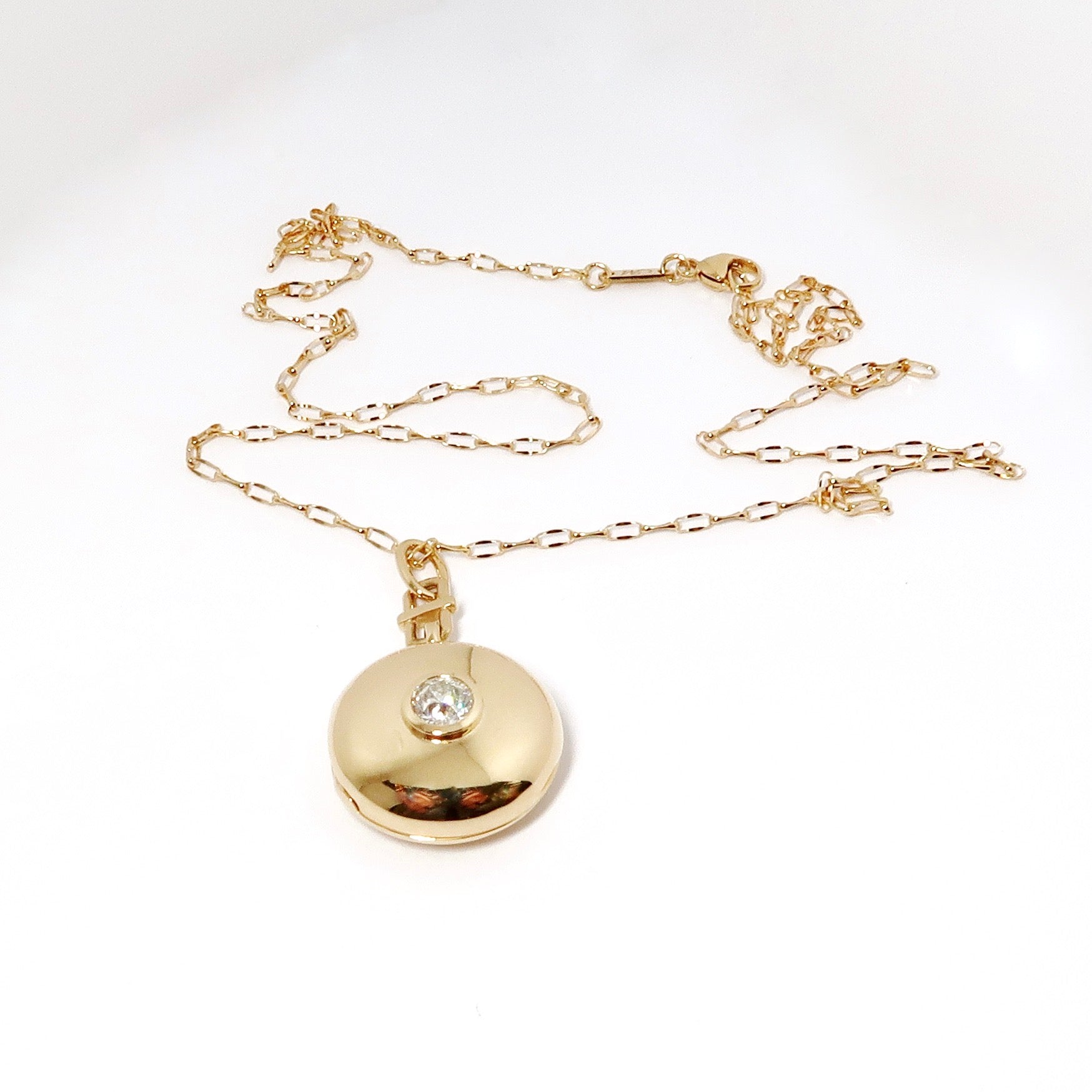 Locket with Center Bezel Set Diamond