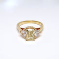 3 Stone Diamond Ring, 1 Fancy Yellow, Radiant Cut Diamond