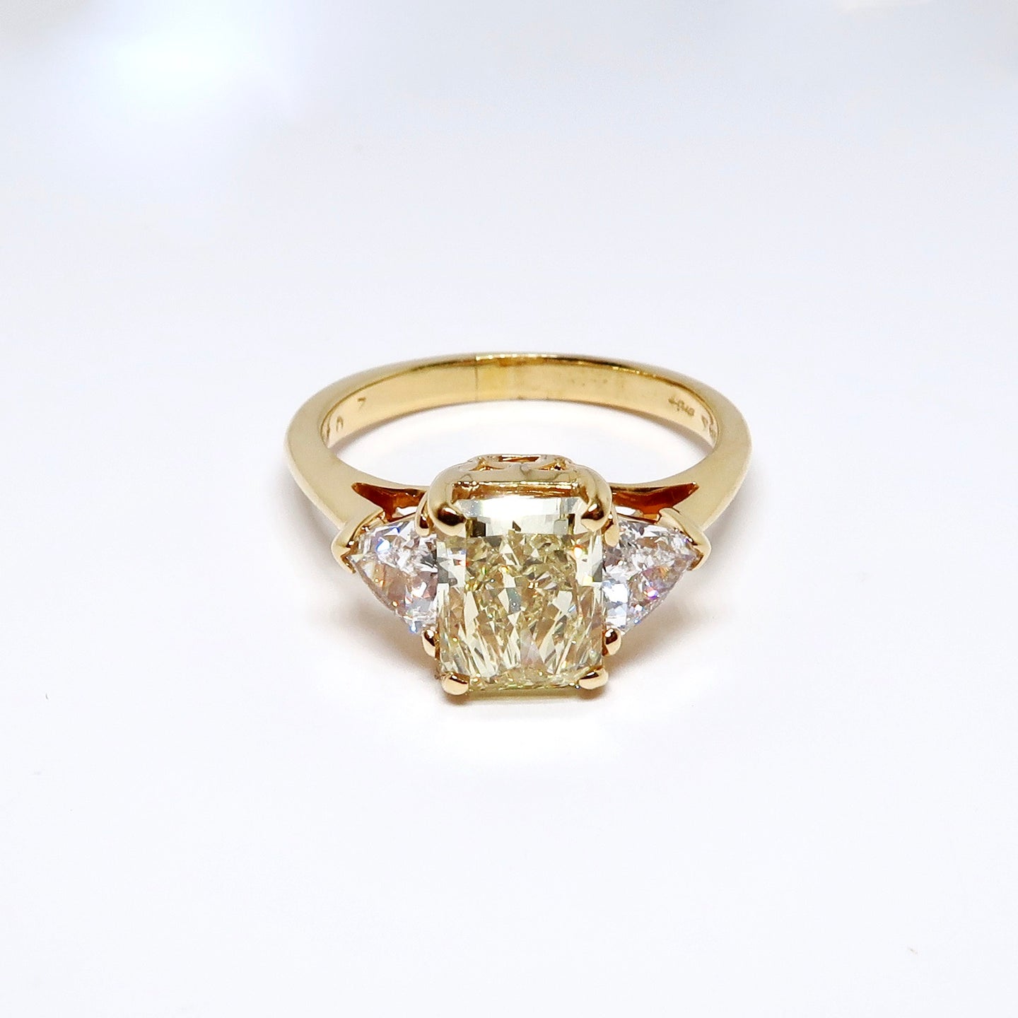 3 Stone Diamond Ring, 1 Fancy Yellow, Radiant Cut Diamond